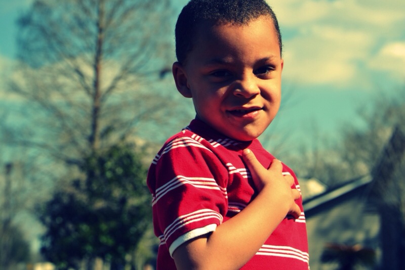 Boy Saluting for Adventist Youth AY Pledge Motto Law and Song