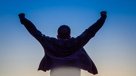 Man with hands stretched Man with hands stretched