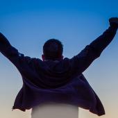 Man with hands stretched